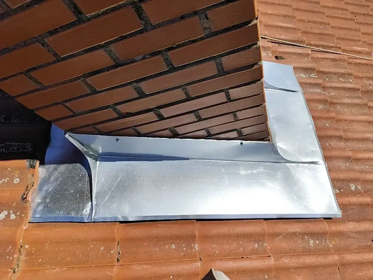 Tile Roof Repair and Chimney Flashing Restoration